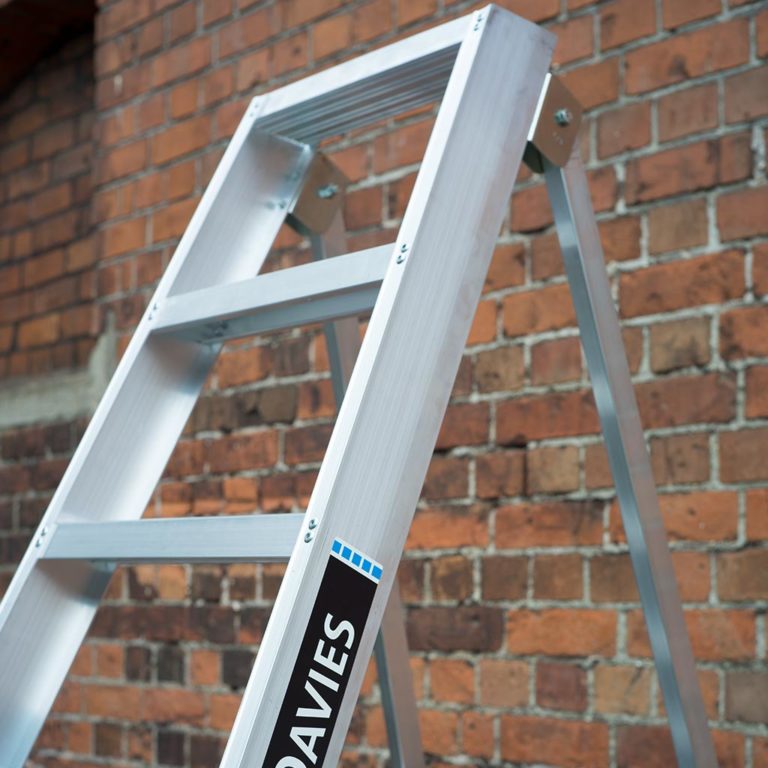 Top section of an industrial professional swingback step ladder